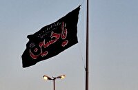 برافراشتن پرچم حسینی در ورودی دروازه مکران هرمزگان