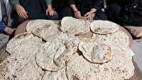 پخت و توزیع نان سنتی صلواتی در شهرستان مهر